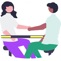 A handshake between two people at a table, representing collaboration and mutual understanding in a business context.